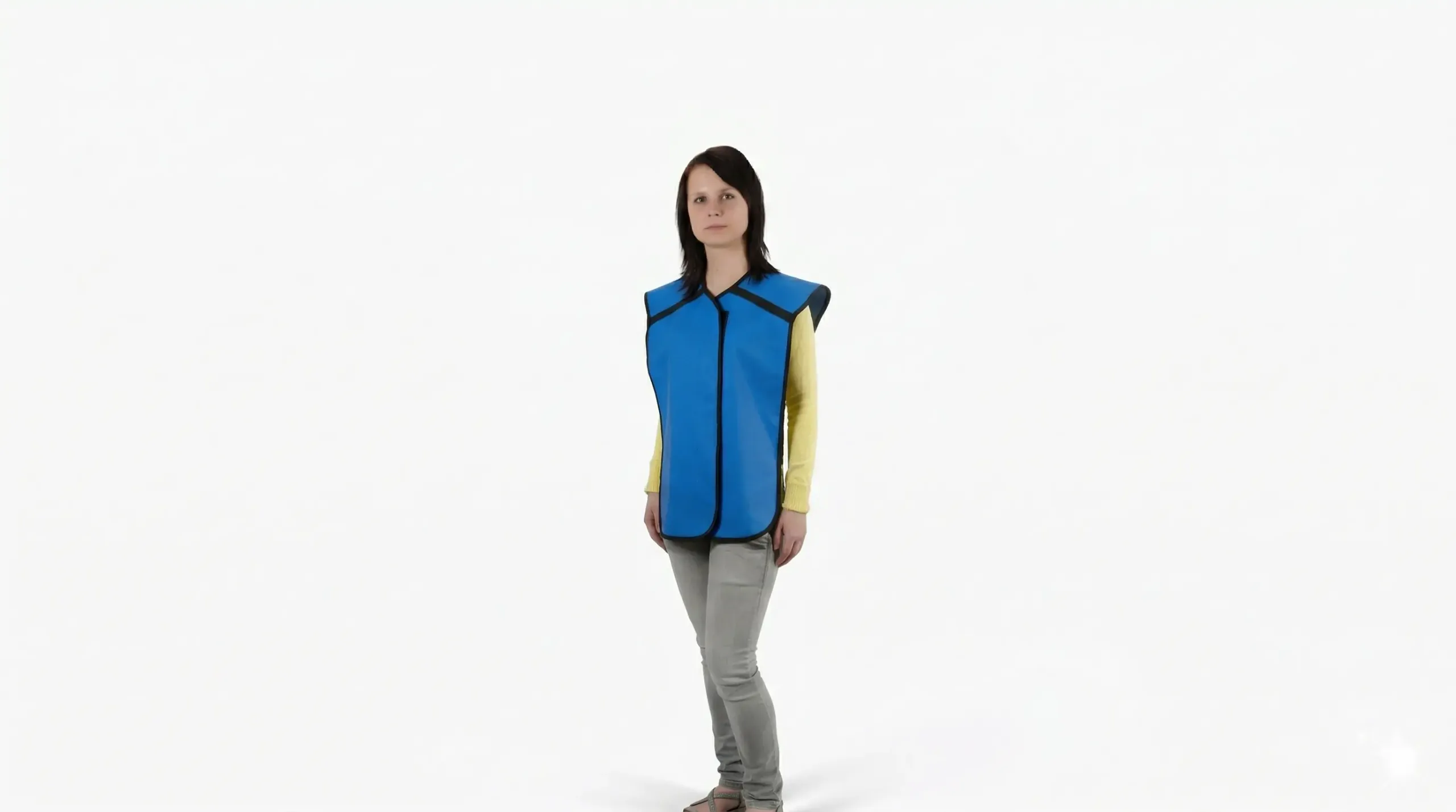 A blue protective lead vest, worn by a person
