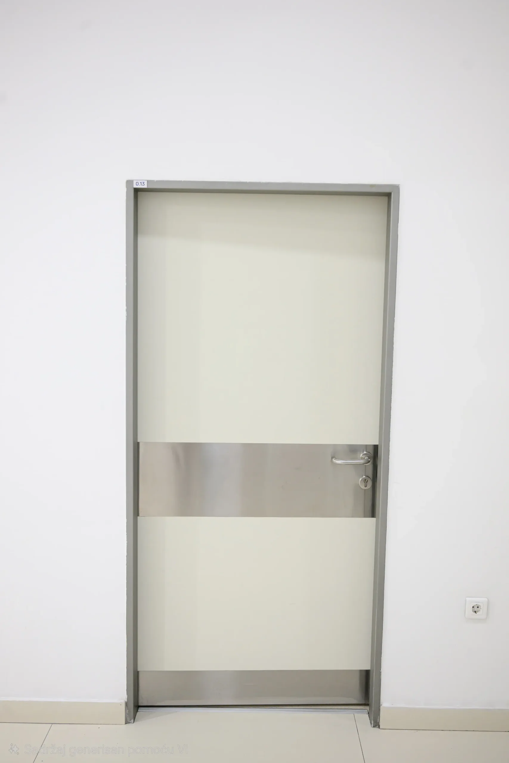 An interior door with a metal frame and stainless steel kick plates on the leaf